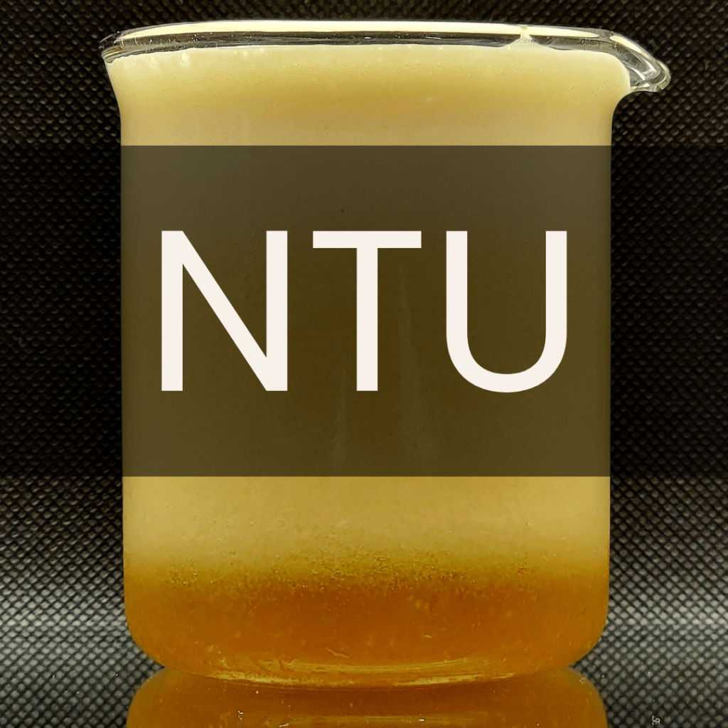 White text reading “NTU” placed in front of a clear 250mL beaker containing beer foam. Turbidity analysis.