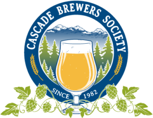 A tulip glass full of yellow beer sits in front of a NW scene. Hop bines gather around the base of the glass. A blue decorative ring has text over the mountains and trees that say "Cascade Brewers Society Since 1982."